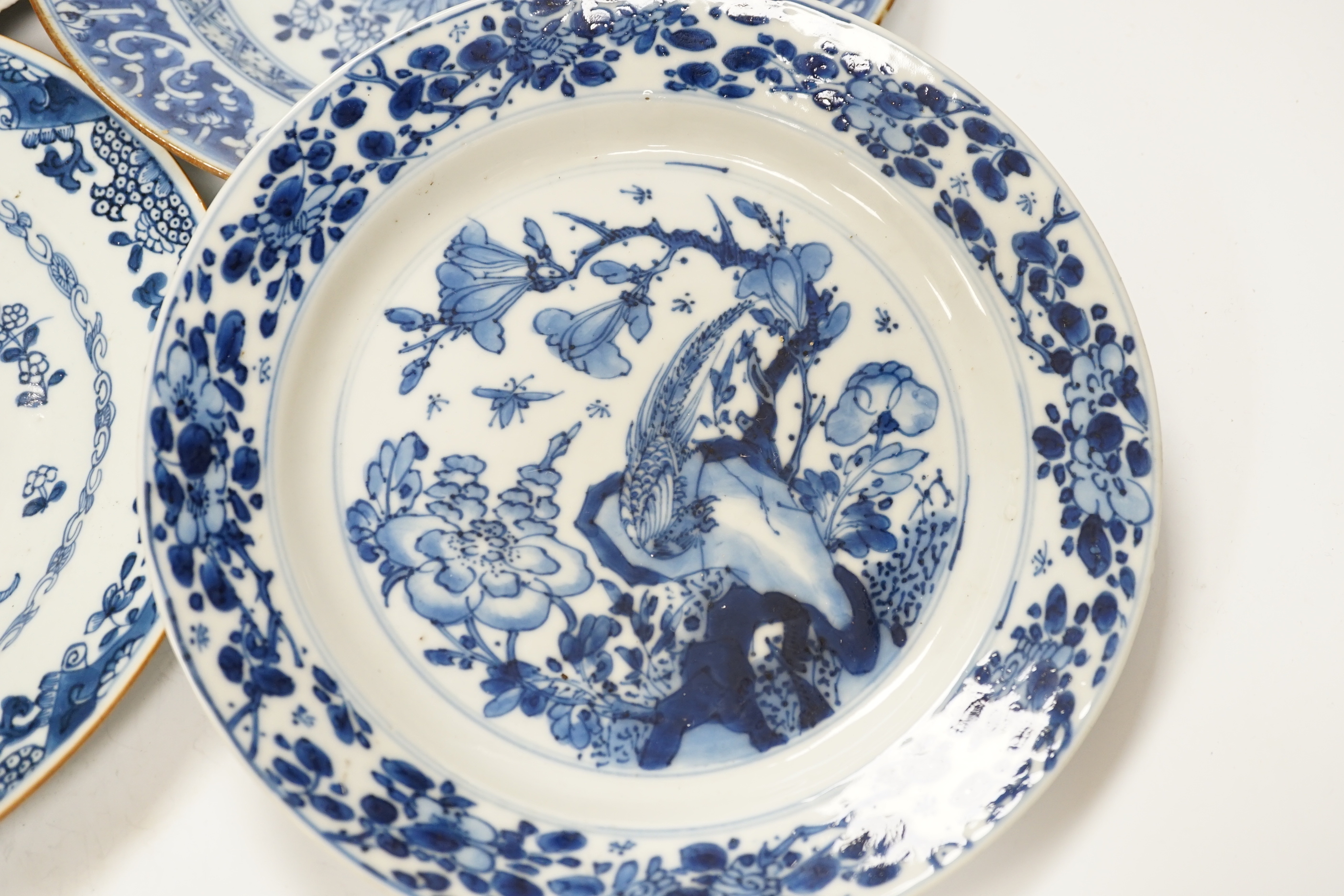 Six 18th century Chinese blue and white dishes and plates, largest 23cm diameter